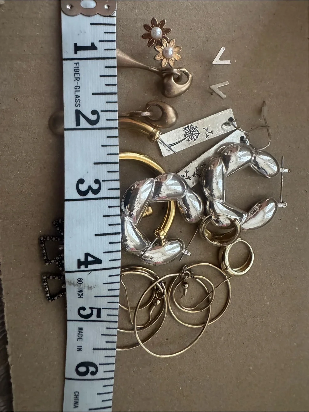 Mixed silver tone and gold tone fashion earrings lot